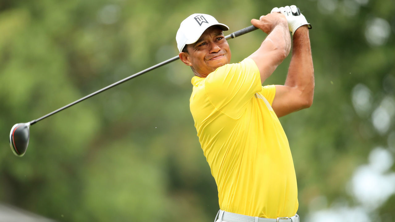 MEDINAH, ILLINOIS - AUGUST 17: Tiger Woods of the United States plays his shot from the fourth tee during the third round of the BMW Championship at Medinah Country Club No. 3 on August 17, 2019 in Medinah, Illinois.