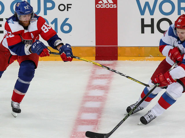 PRAGUE, CZECH REPUBLIC - SEPTEMBER 10: Jakub Voracek (L) of Czech Republic and Vladimir Tarasenko (R) of Russia battle for the puck during the 2016 World Cup of Hockey preparation match between Czech Republic and Russia at O2 Arena Prague on September 10, 2016 in Prague, Czech Republic.