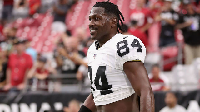 GLENDALE, ARIZONA - AUGUST 15: Wide receiver Antonio Brown #84 of the Oakland Raiders warms up before the NFL preseason game against the Arizona Cardinals at State Farm Stadium on August 15, 2019 in Glendale, Arizona.