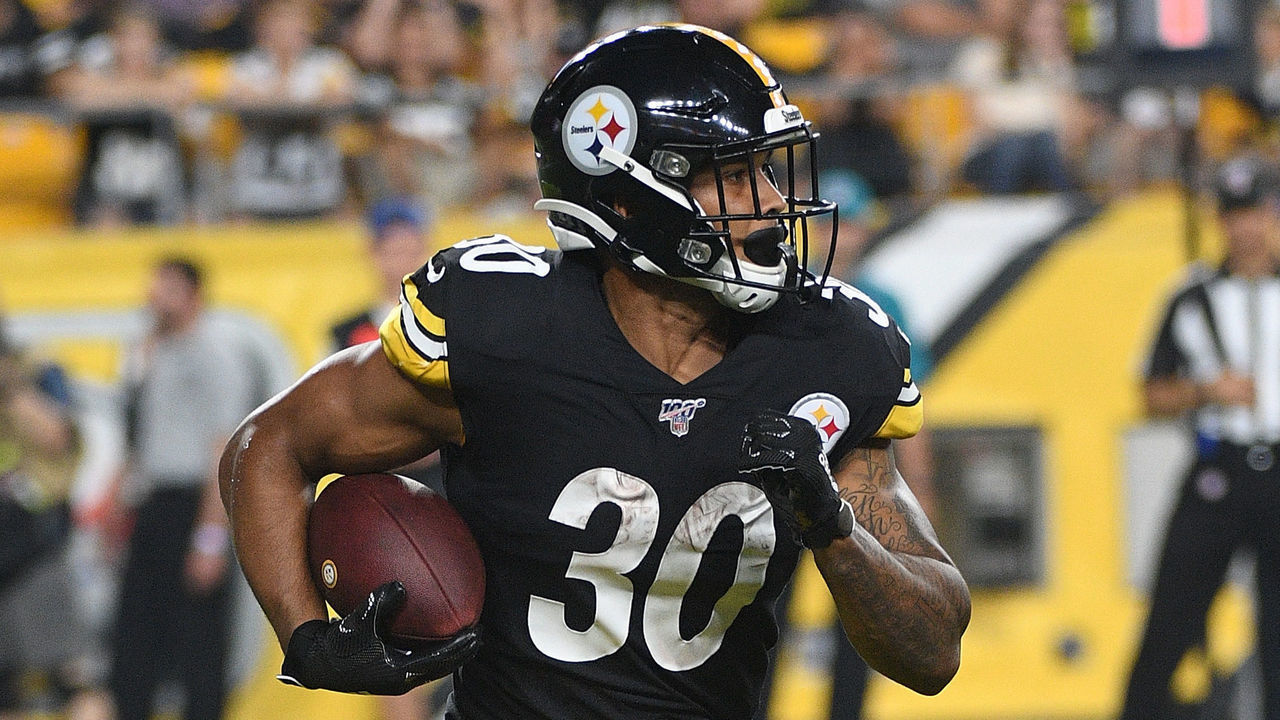 PITTSBURGH, PA - AUGUST 17: James Conner #30 of the Pittsburgh Steelers carries the ball in the first half during a preseason game against the Kansas City Chiefs at Heinz Field on August 17, 2019 in Pittsburgh, Pennsylvania.