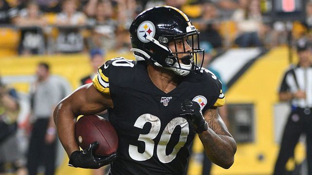 PITTSBURGH, PA - AUGUST 17: James Conner #30 of the Pittsburgh Steelers carries the ball in the first half during a preseason game against the Kansas City Chiefs at Heinz Field on August 17, 2019 in Pittsburgh, Pennsylvania.