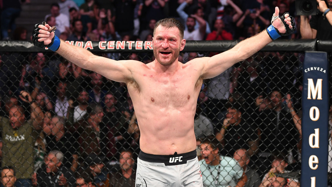 ANAHEIM, CALIFORNIA - AUGUST 17: Stipe Miocic celebrates his TKO victory over Daniel Cormier in their heavyweight championship bout during the UFC 241 event at the Honda Center on August 17, 2019 in Anaheim, California.