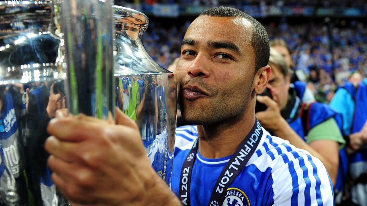 Chelsea's Ashley Cole celebrates with the UEFA Champions League trophy
