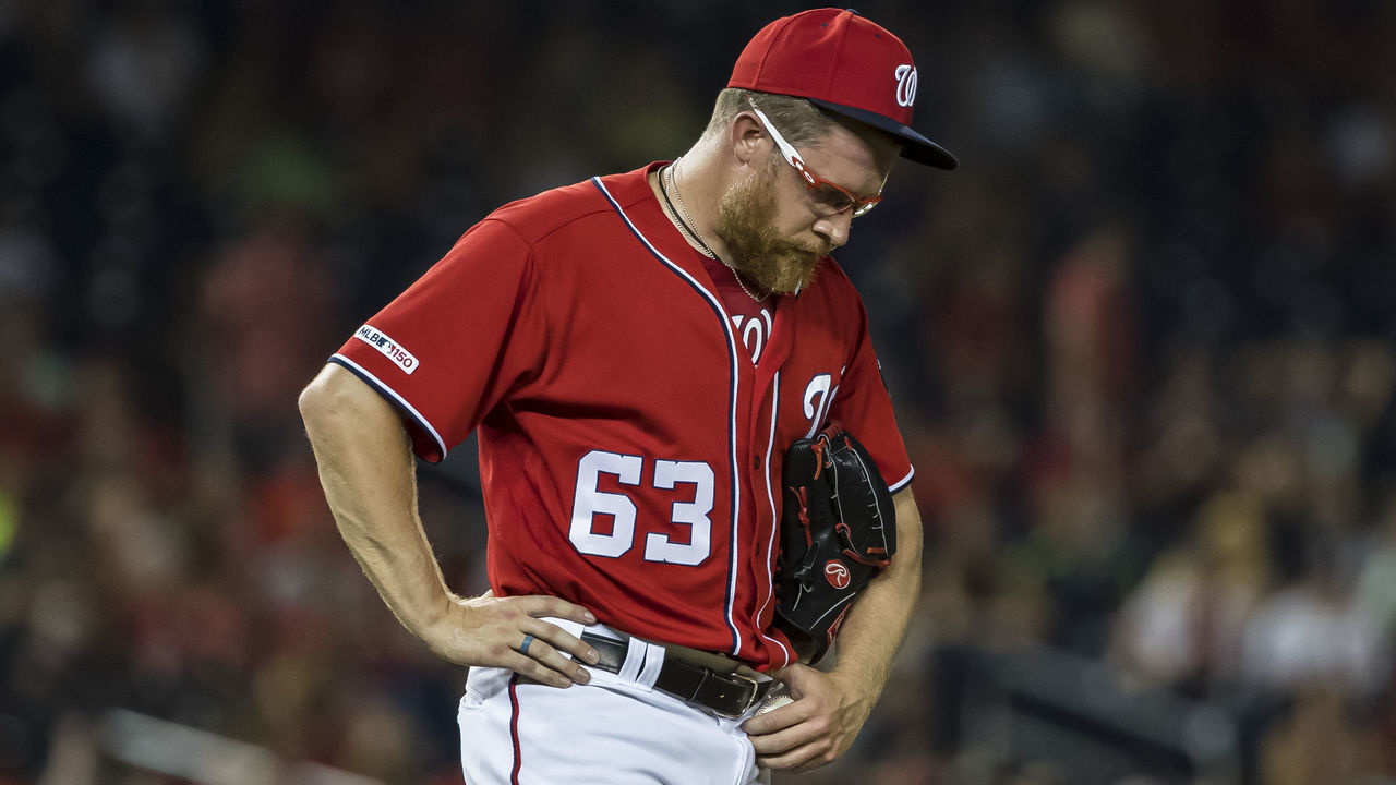 WASHINGTON, DC - AUGUST 17: Sean Doolittle #63 of the Washington Nationals reacts after giving up a home run against the Milwaukee Brewers during the ninth inning at Nationals Park on August 17, 2019 in Washington, DC.