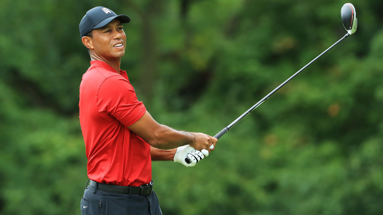 MEDINAH, ILLINOIS - AUGUST 18: Tiger Woods of the United States plays his shot from the fifth tee during the final round of the BMW Championship at Medinah Country Club No. 3 on August 18, 2019 in Medinah, Illinois.