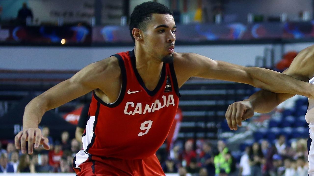 ST CATHARINES, ON - JUNE 16: Quentin Grimes #6 of the United States dribbles the ball as Addison Patterson #9 of Canada defends during the Gold Medal final of the FIBA U18 Americas Championship at the Meridian Centre on June 16, 2018 in St. Catharines, Canada.