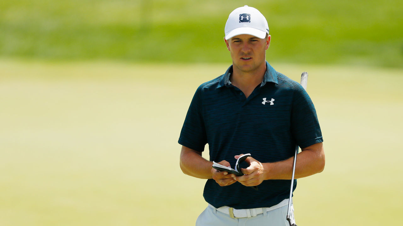 JERSEY CITY, NEW JERSEY - AUGUST 11: Jordan Spieth of the United States checks his yardage book on the seventh green during the final round of The Northern Trust at Liberty National Golf Club on August 11, 2019 in Jersey City, New Jersey.