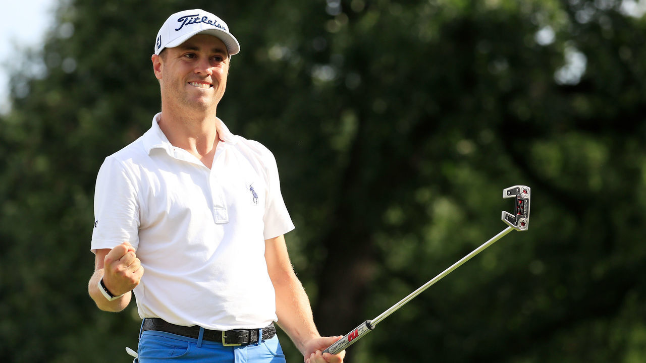 MEDINAH, ILLINOIS - AUGUST 18: Justin Thomas of the United States celebrates on the 18th green after winning during the final round of the BMW Championship at Medinah Country Club No. 3 on August 18, 2019 in Medinah, Illinois.