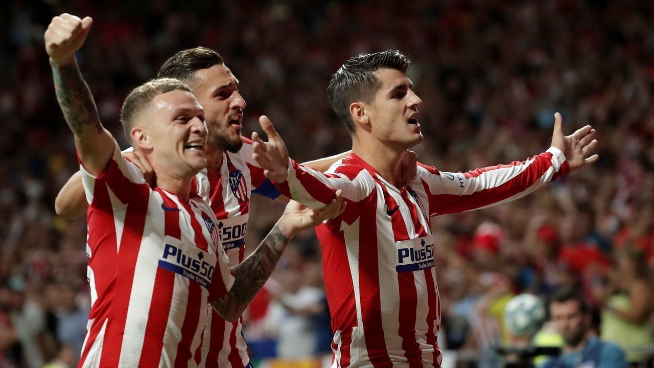 MADRID, SPAIN - AUGUST 18: Atletico Madrid's Alvaro Morata (R) celebrates with Kieran Trippier (L) and Koke (C) after scoring a goal during the La Liga soccer match between Atletico Madrid and Getafe CF at the Wanda Metropolitano Stadium in Madrid, Spain on August 18, 2019.