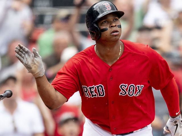 Boston Red Sox Third base Rafael Devers throws to first during the News  Photo - Getty Images