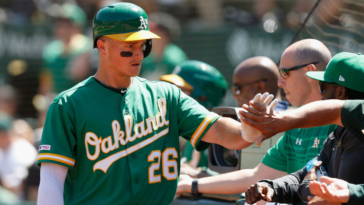 OAKLAND, CALIFORNIA - AUGUST 17: Matt Chapman #26 of the Oakland Athletics celebrates after scoring on a single by Mark Canha #20 in the bottom of the third inning against the Houston Astros at Ring Central Coliseum on August 17, 2019 in Oakland, California.