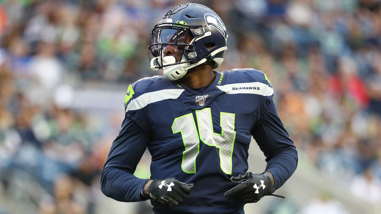 SEATTLE, WASHINGTON - AUGUST 08: D.K. Metcalf #14 of the Seattle Seahawks looks on against the Denver Broncos in the fourth quarter during their preseason game at CenturyLink Field on August 08, 2019 in Seattle, Washington.