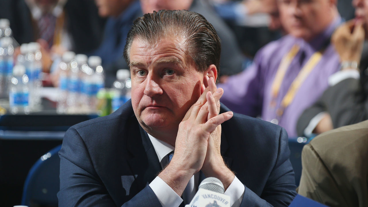 BUFFALO, NY - JUNE 24: Jim Benning of the Vancouver Canucks attends round one of the 2016 NHL Draft on June 24, 2016 in Buffalo, New York.