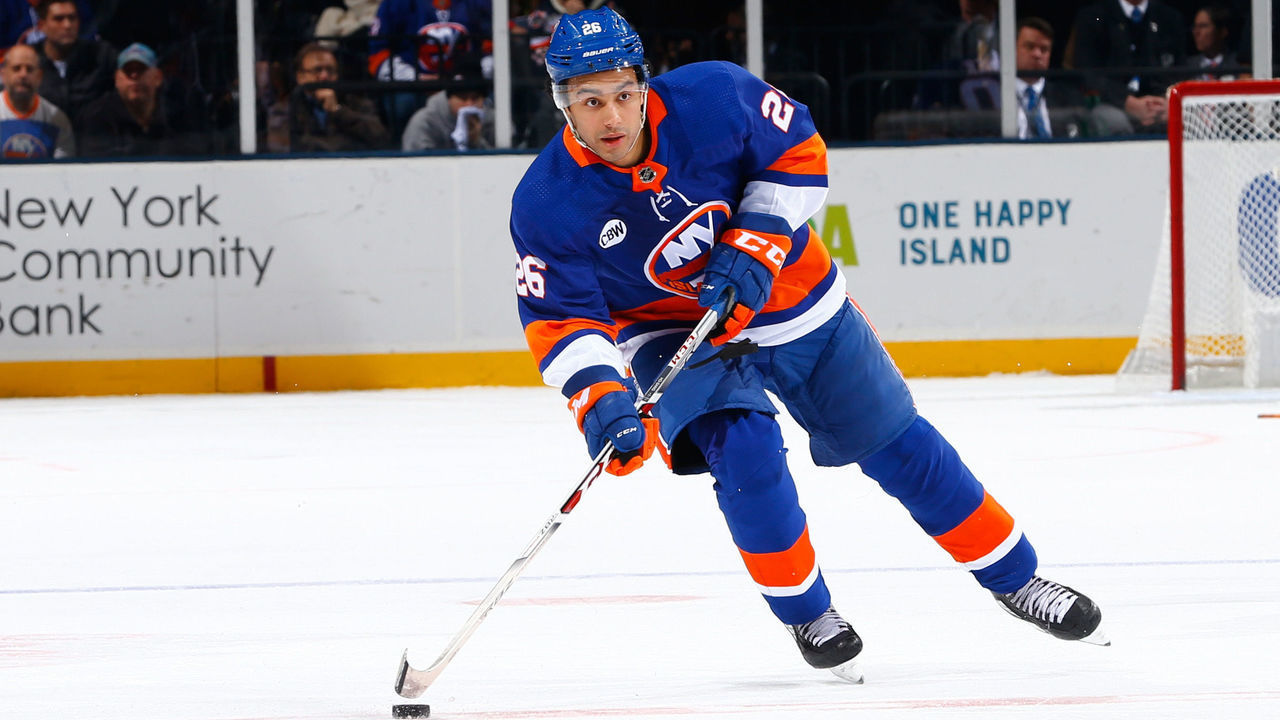UNIONDALE, NY - JANUARY 03: Joshua Ho-Sang #26 of the New York Islanders skates agaknst the Chicago Blackhawks at Nassau Veterans Memorial Coliseum on January 3, 2019 in Uniondale, New York. New York Islanders defeated the Chicago Blackhawks 4-3 in overtime.