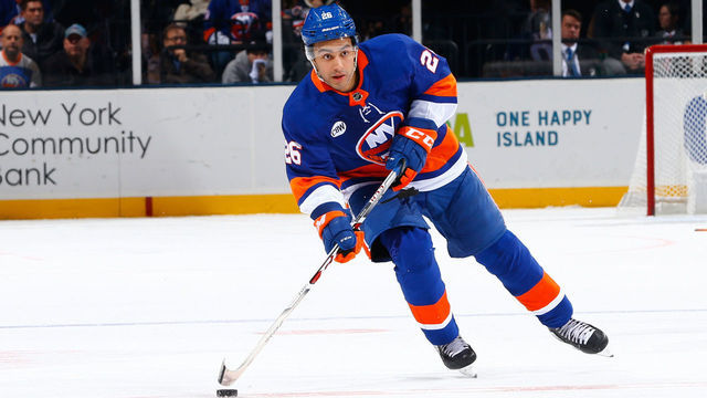 UNIONDALE, NY - JANUARY 03: Joshua Ho-Sang #26 of the New York Islanders skates agaknst the Chicago Blackhawks at Nassau Veterans Memorial Coliseum on January 3, 2019 in Uniondale, New York. New York Islanders defeated the Chicago Blackhawks 4-3 in overtime.