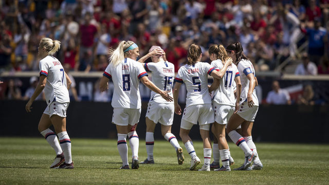 HARRISON, NJ - MAY 26: Megan Rapinoe #15 of United States with pink dyed hair, Captain Alex Morgan #13 of United States, Kelley O'Hara #5 of United States, Julie Ertz #8 of United States come over to congratulate Tobin Heath #17 of United States on her goal during the International Friendly match the U.S. Women's National Team and Mexico as part of the Send Off Series prior to the FIFA Women's World Cup at Red Bull Arena on May 26 2019 in Harrison, NJ, USA. The United States Women's National team won the match with a score of 3 to 0.