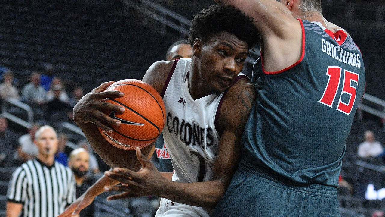 LAS VEGAS, NV - NOVEMBER 22: DeAndre Dishman #2 of the Eastern Kentucky Colonels drives against Benas Griciunas #15 of the Eastern Washington Eagles during day two of the Main Event basketball tournament at T-Mobile Arena on November 22, 2017 in Las Vegas, Nevada.