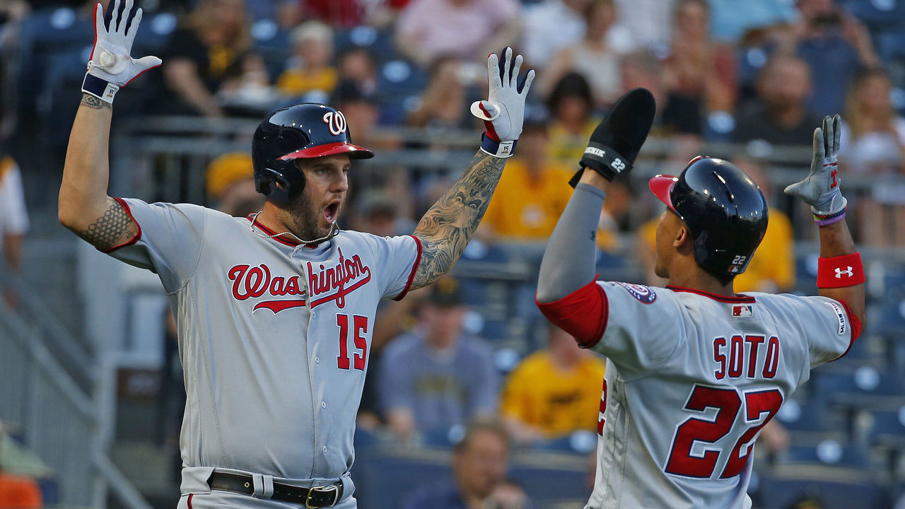 PITTSBURGH, PA - AUGUST 19: Matt Adams #15 of the Washington Nationals celebrates with Juan Soto #22 after hitting a two run home run in the first inning against the Pittsburgh Pirates at PNC Park on August 19, 2019 in Pittsburgh, Pennsylvania.