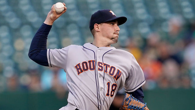 OAKLAND, CA - AUGUST 15: Aaron Sanchez #18 of the Houston Astros pitches against the Oakland Athletics in the bottom of the first inning at Ring Central Coliseum on August 15, 2019 in Oakland, California.