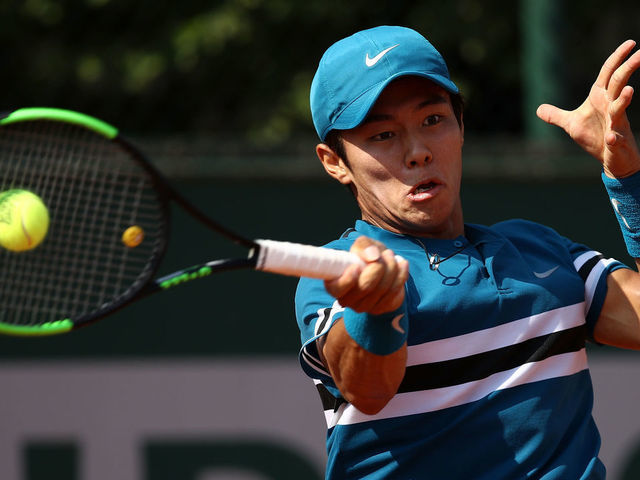 PARIS, FRANCE - MAY 25: Duckhee Lee of Korea plays a forehand during his third round menÕs qualifying singles match against Jaume Munar of Spain at Roland Garros on May 25, 2018 in Paris, France.