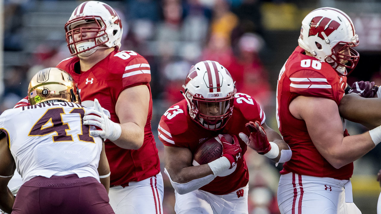 MADISON, WI - NOVEMBER 24: Wisconsin Badgers running back Jonathan Taylor (23) looks for a open hole during an college football game between the Minnesota Golden Gophers and the Wisconsin Badgers on November 24th, 2018 at the Camp Randall Stadium in Madison, WI.