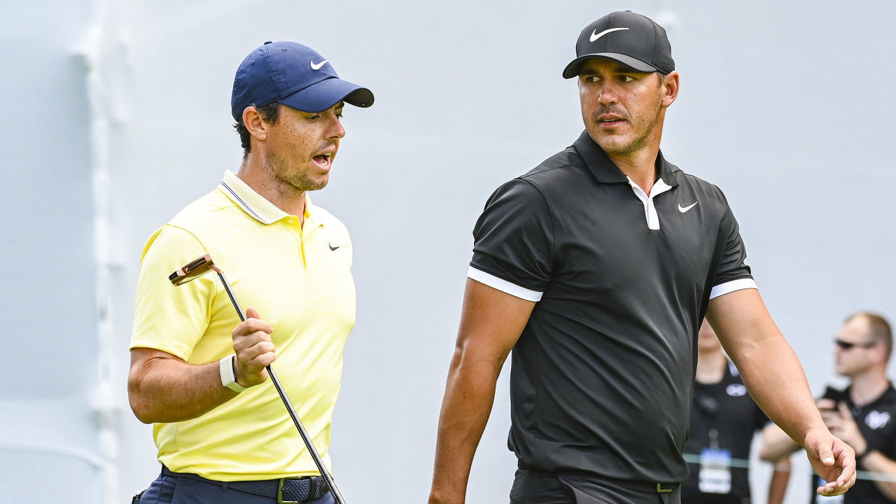 MEDINAH, IL - AUGUST 15: Rory McIlroy of Northern Ireland and Brooks Koepka talk as they walk off the 17th hole tee box during the first round of the BMW Championship, the second event of the FedExCup Playoffs, at Medinah Country Club (No. 3) on August 15, 2019 in Medinah, Illinois.