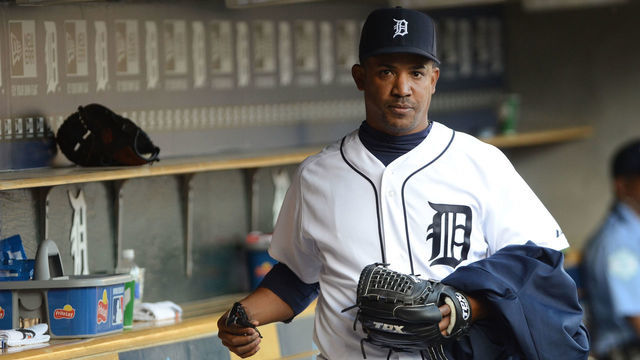 DETROIT, MI - APRIL 07: Octavio Dotel #20 of the Detroit Tigers looks on during the game against the Boston Red Sox at Comerica Park on April 7, 2012 in Detroit, Michigan. Dotel became the first player in Major League history to play for 13 teams while pitching in the 7th inning. The Tigers defeated the Red Sox 10-0.