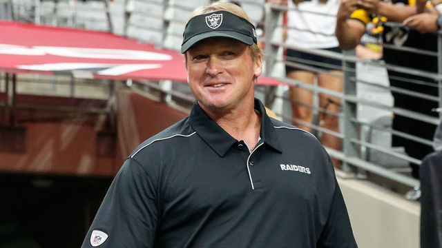 GLENDALE, AZ - AUGUST 15: Oakland Raiders head coach Jon Gruden smiles before the NFL preseason football game between the Oakland Raiders and the Arizona Cardinals on August 15, 2019 at State Farm Stadium in Glendale, Arizona.