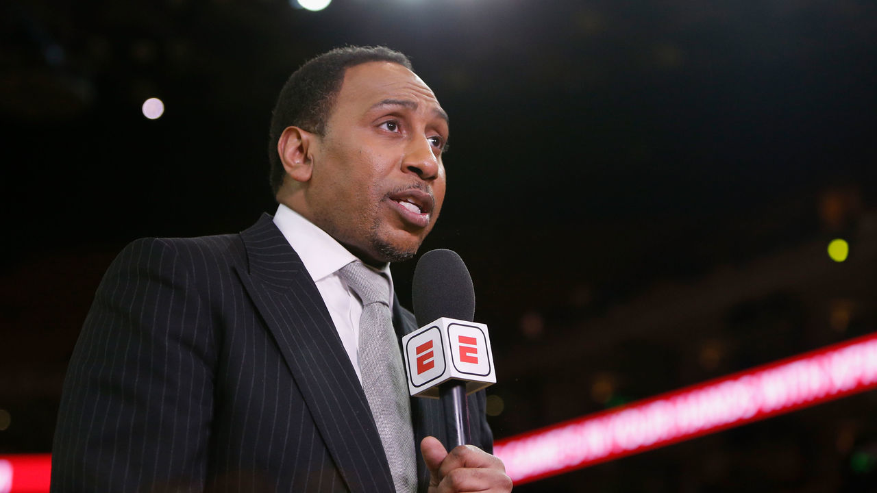 OAKLAND, CALIFORNIA - MAY 08: TV analyst Stephen A. Smith reports from court side before Game Five of the Western Conference Semifinals of the 2019 NBA Playoffs at ORACLE Arena on May 08, 2019 in Oakland, California.