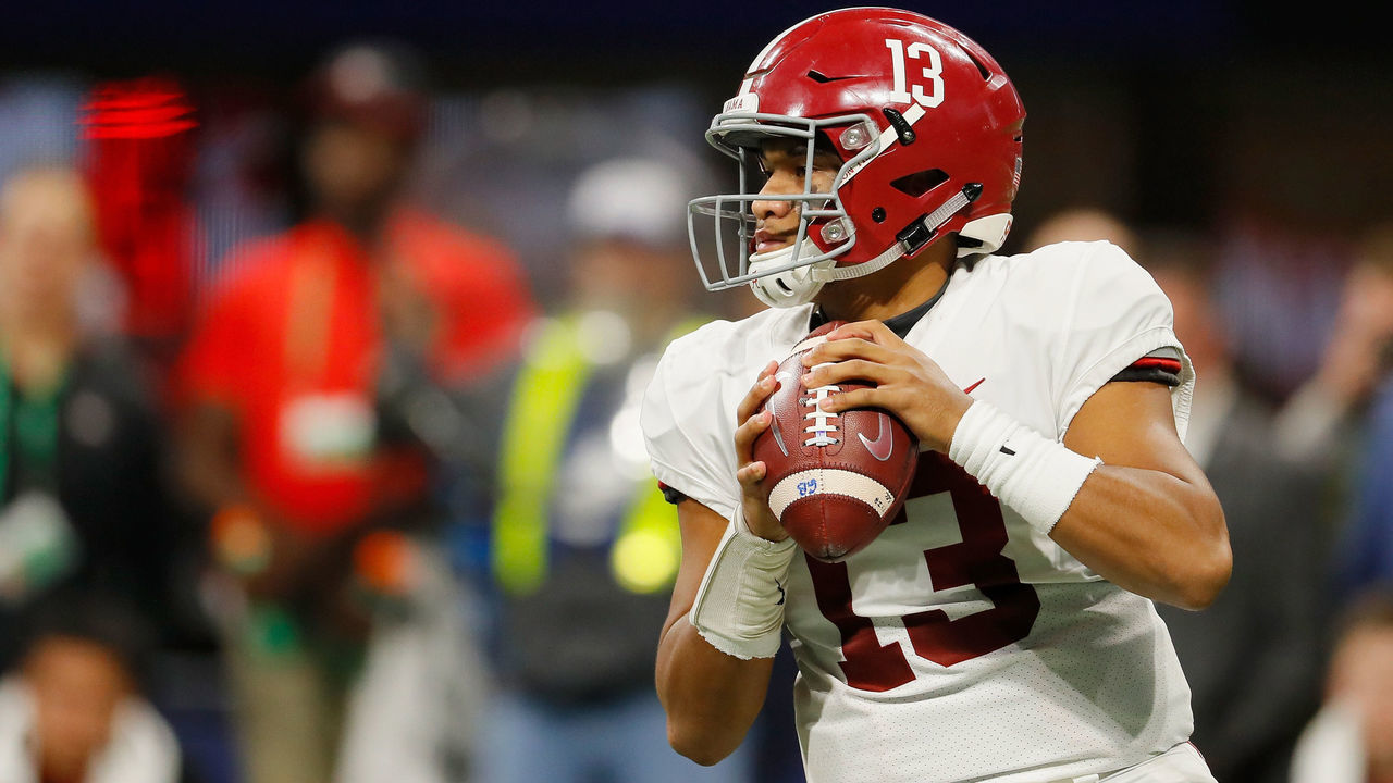 ATLANTA, GA - DECEMBER 01: Tua Tagovailoa #13 of the Alabama Crimson Tide looks to pass in the first half against the Georgia Bulldogs during the 2018 SEC Championship Game at Mercedes-Benz Stadium on December 1, 2018 in Atlanta, Georgia.
