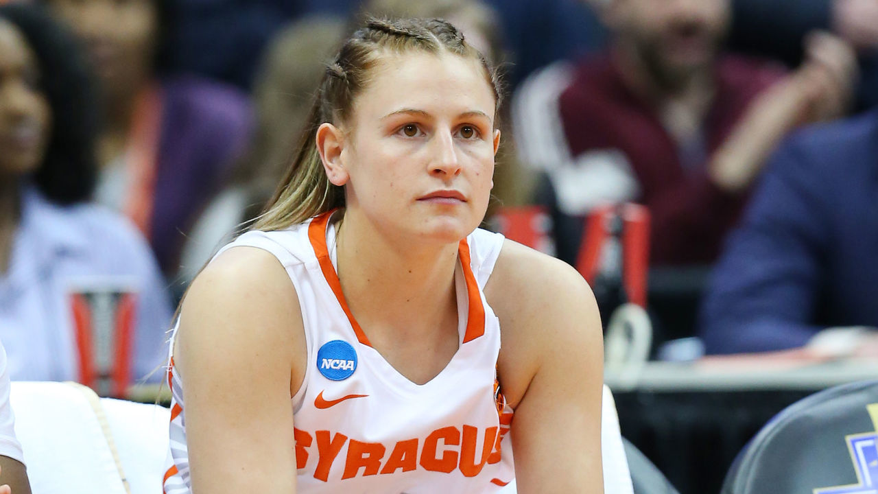 SYRACUSE, NY - MARCH 25: Tiana Mangakahia #4 of the Syracuse Orange sits on the bench prior to the game against the South Dakota State Jackrabbits in the second round of the 2019 NCAA Women's Basketball Tournament at the Carrier Dome on March 25, 2019 in Syracuse, New York.