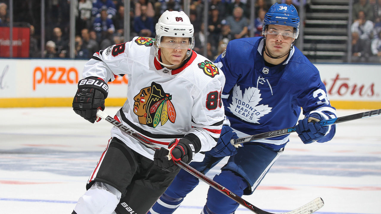 TORONTO, ON - OCTOBER 9: Patrick Kane #88 of the Chicago Blackhawks is shadowed by Auston Matthews #34 of the Toronto Maple Leafs in an NHL game at the Air Canada Centre on October 9, 2017 in Toronto, Ontario.