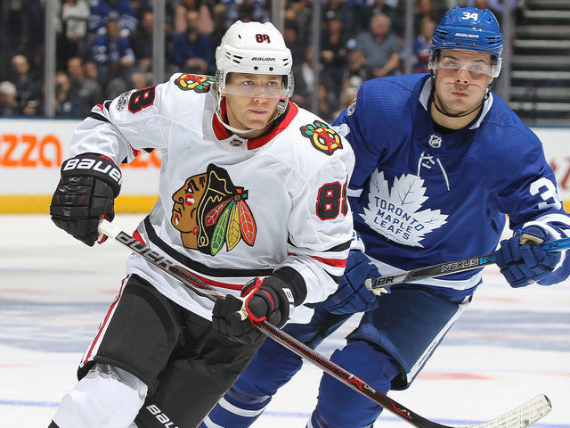 TORONTO, ON - OCTOBER 9: Patrick Kane #88 of the Chicago Blackhawks is shadowed by Auston Matthews #34 of the Toronto Maple Leafs in an NHL game at the Air Canada Centre on October 9, 2017 in Toronto, Ontario.