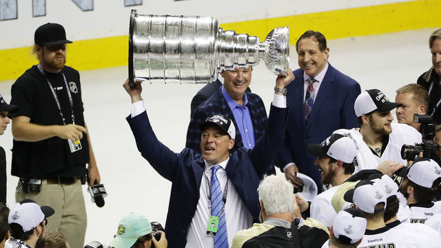SAN JOSE, CA - JUNE 12: Bill Guerin Assistant General Manager of the Pittsburgh Penguins celebrates by hoisting the Stanley Cup after a 3-1 victory to win the Stanley Cup against the San Jose Sharks in Game Six of the 2016 NHL Stanley Cup Final at SAP Center on June 12, 2016 in San Jose, California. The Pittsburgh Penguins defeat the San Jose Sharks 3-1.