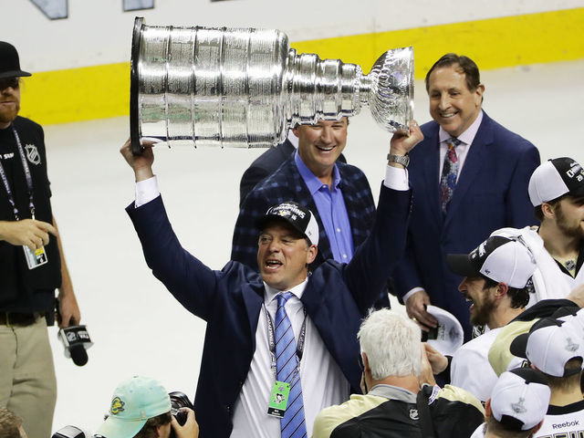 SAN JOSE, CA - JUNE 12: Bill Guerin Assistant General Manager of the Pittsburgh Penguins celebrates by hoisting the Stanley Cup after a 3-1 victory to win the Stanley Cup against the San Jose Sharks in Game Six of the 2016 NHL Stanley Cup Final at SAP Center on June 12, 2016 in San Jose, California. The Pittsburgh Penguins defeat the San Jose Sharks 3-1.