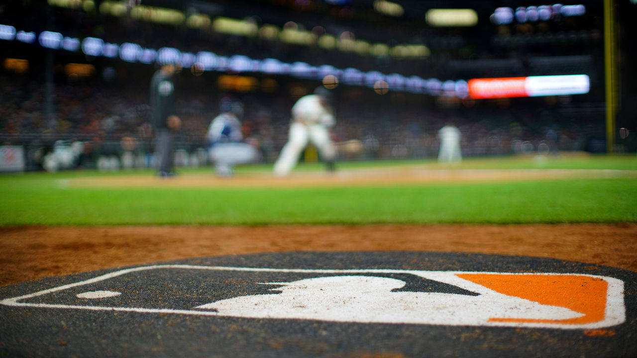 SAN FRANCISCO, CALIFORNIA - APRIL 09: A detailed view of the MLB logo on the on deck circle during the game between the San Francisco Giants and the San Diego Padres at Oracle Park on April 09, 2019 in San Francisco, California.