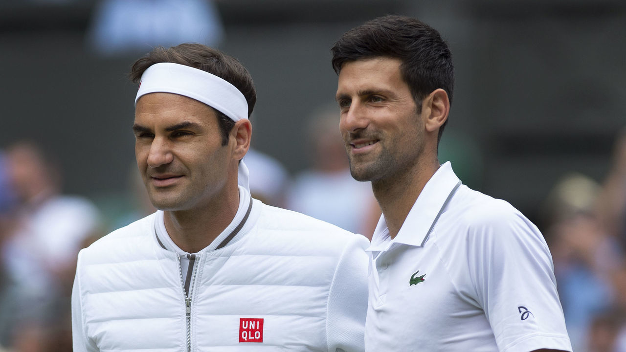 LONDON, ENGLAND - JULY 14: Roger Federer of Switzerland and Novak Djokovic of Serbia pose together before the Final of the Gentlemen's Singles on Day Thirteen of The Championships - Wimbledon 2019 at All England Lawn Tennis and Croquet Club on July 14, 2019 in London, England.