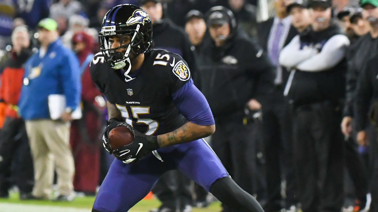 BALTIMORE, MD - DECEMBER 30, 2018: Wide receiver Michael Crabtree #15 of the Baltimore Ravens carries the ball in the second quarter of a game against the Cleveland Browns on December 30, 2018 at M&T Bank Stadium in Baltimore, Maryland. Baltimore won 26-24. (Photo by: 2018 Nick Cammett/Diamond Images/Getty Images)