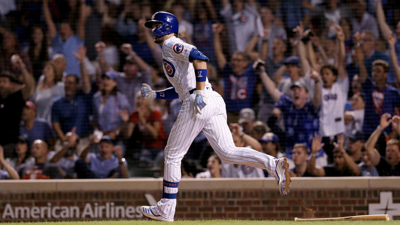 CHICAGO, ILLINOIS - AUGUST 21: Kris Bryant #17 of the Chicago Cubs looks on after hitting a home run in the eighth inning against the San Francisco Giants at Wrigley Field on August 21, 2019 in Chicago, Illinois.