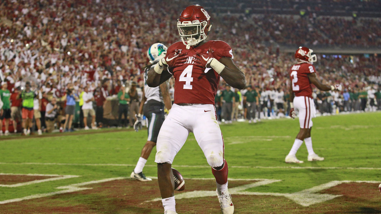 NORMAN, OK - SEPTEMBER 16: Running back Trey Sermon #4 of the Oklahoma Sooners celebrates a touchdown against the Tulane Green Wave at Gaylord Family Oklahoma Memorial Stadium on September 16, 2017 in Norman, Oklahoma. Oklahoma defeated Tulane 56-14.