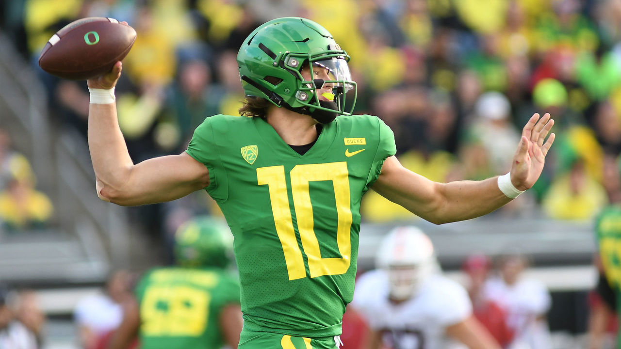 EUGENE, OR - SEPTEMBER 22: University of Oregon QB Justin Herbert (10) rolls out to pass during a college football game between the Oregon Ducks and Stanford Cardinal on September 22, 2018, at Autzen Stadium in Eugene, Oregon.