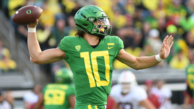 EUGENE, OR - SEPTEMBER 22: University of Oregon QB Justin Herbert (10) rolls out to pass during a college football game between the Oregon Ducks and Stanford Cardinal on September 22, 2018, at Autzen Stadium in Eugene, Oregon.
