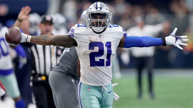 ARLINGTON, TX - SEPTEMBER 30: Ezekiel Elliott #21 of the Dallas Cowboys reacts after completing a pass against Jarrad Davis #40 of the Detroit Lions in the fourth quarter at AT&T Stadium on September 30, 2018 in Arlington, Texas.