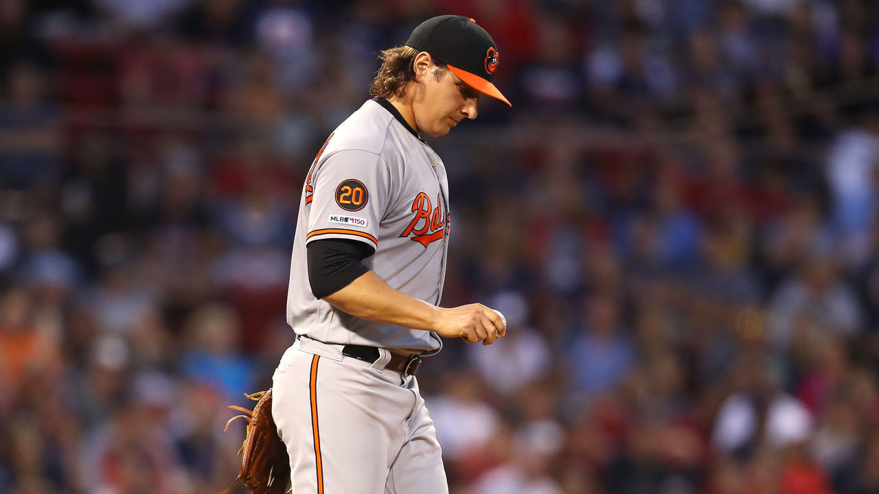 BOSTON, MASSACHUSETTS - AUGUST 17: Asher Wojciechowski #29 of the Baltimore Orioles looks on between pitches against the Boston Red Sox during the second inning at Fenway Park on August 17, 2019 in Boston, Massachusetts.
