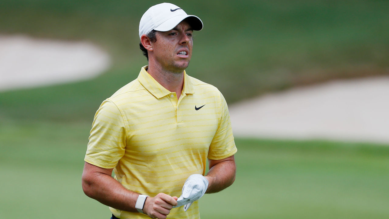 ATLANTA, GEORGIA - AUGUST 22: Rory McIlroy of Northern Ireland walks on the first hole during the first round of the TOUR Championship at East Lake Golf Club on August 22, 2019 in Atlanta, Georgia.