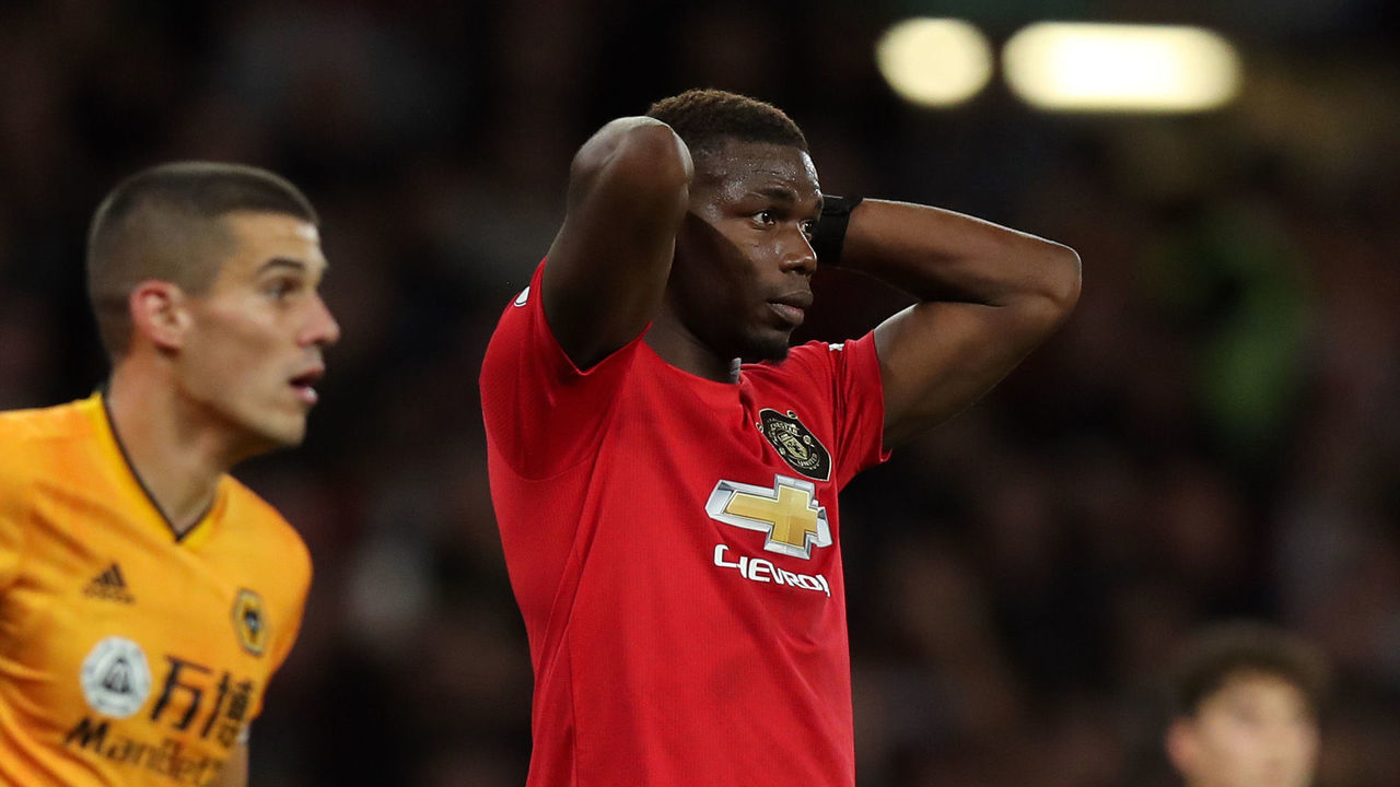 WOLVERHAMPTON, ENGLAND - AUGUST 19: Paul Pogba of Manchester United reacts after missing a penalty in the second half during the Premier League match between Wolverhampton Wanderers and Manchester United at Molineux on August 19, 2019 in Wolverhampton, United Kingdom.