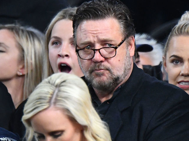 MELBOURNE, AUSTRALIA - AUGUST 22: Russell Crowe watches on during the International Basketball Friendly match between the Australian Boomers and Team USA United States of America at Marvel Stadium on August 22, 2019 in Melbourne, Australia.