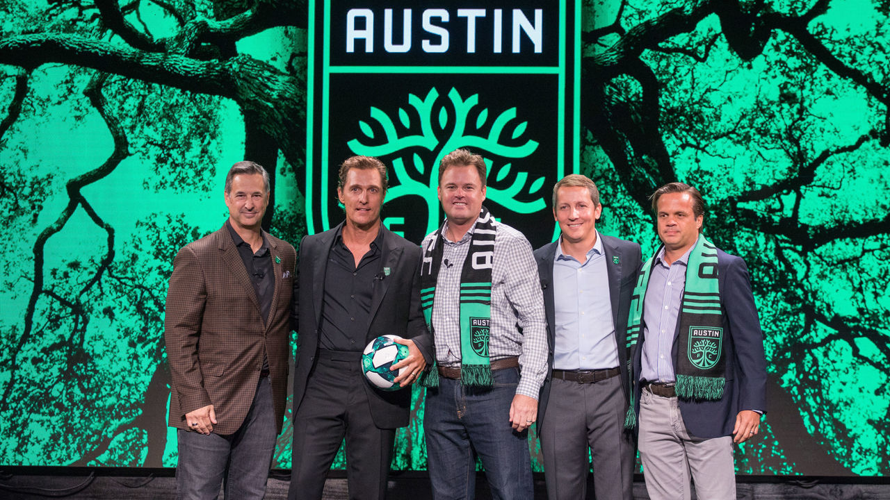 AUSTIN, TEXAS - AUGUST 23: (L-R) Marius Haas, President and CCO of Dell Technologies, Matthew McConaughey, Academy Award-winning actor, 'Minister of Culture' / M.O.C., Anthony Precourt, majority partner and CEO of Austin FC and Two Oak Ventures, Eddie Margain, founder of PIXIU Investments, and Bryan Sheffield, founder and Executive Chairman of Austin-based Parsley Energy attend the Austin FC Major League Soccer club announcement press conference at 3TEN ACL Live on August 23, 2019 in Austin, Texas.