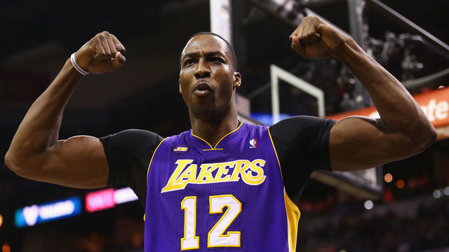SAN ANTONIO, TX - APRIL 24: Dwight Howard #12 of the Los Angeles Lakers reacts after being fouled against the San Antonio Spurs during Game Two of the Western Conference Quarterfinals of the 2013 NBA Playoffs at AT&T Center on April 24, 2013 in San Antonio, Texas.