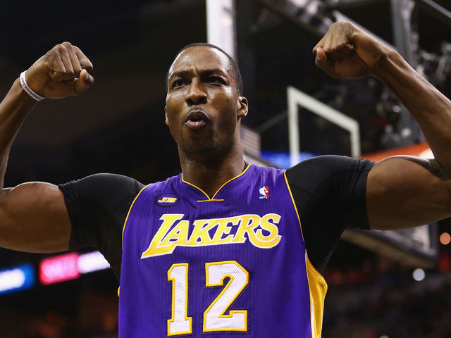 SAN ANTONIO, TX - APRIL 24: Dwight Howard #12 of the Los Angeles Lakers reacts after being fouled against the San Antonio Spurs during Game Two of the Western Conference Quarterfinals of the 2013 NBA Playoffs at AT&T Center on April 24, 2013 in San Antonio, Texas.
